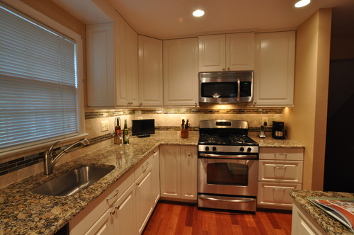  Giallo Fiorito granite countertops white cabinets
